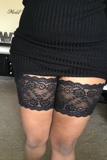 a reviewer wearing a lace band on each thigh 
