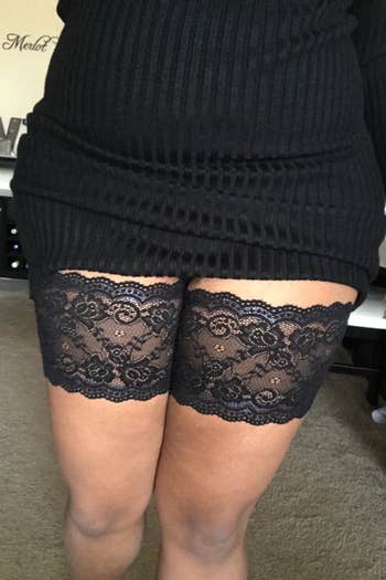 a reviewer wearing a lace band on each thigh 