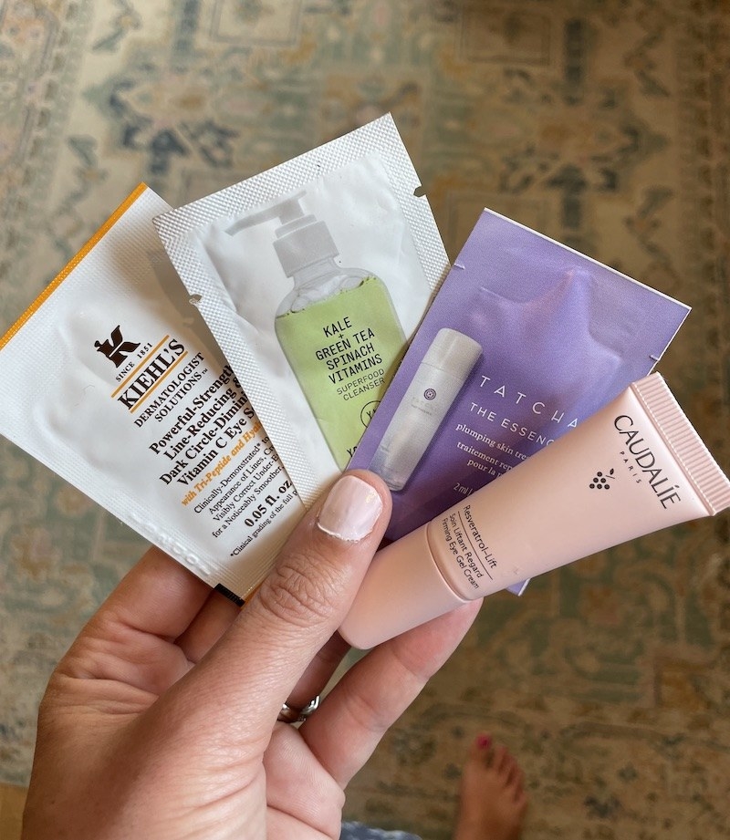 The author shows off some skincare samples.