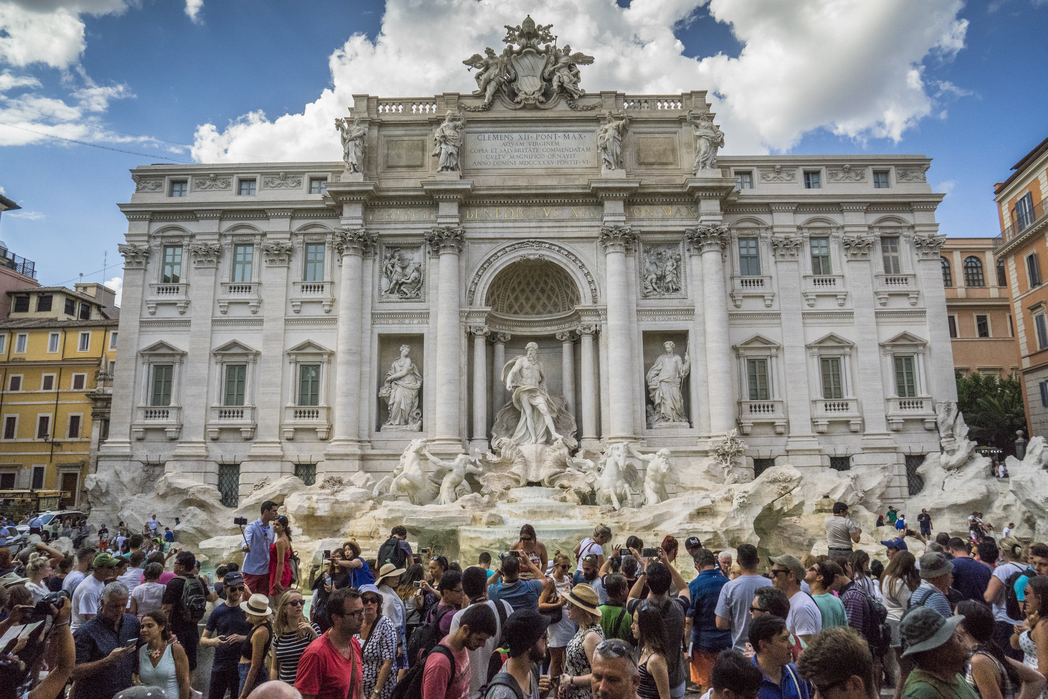 A busy plaza by the Trevi Fountain in Rome.