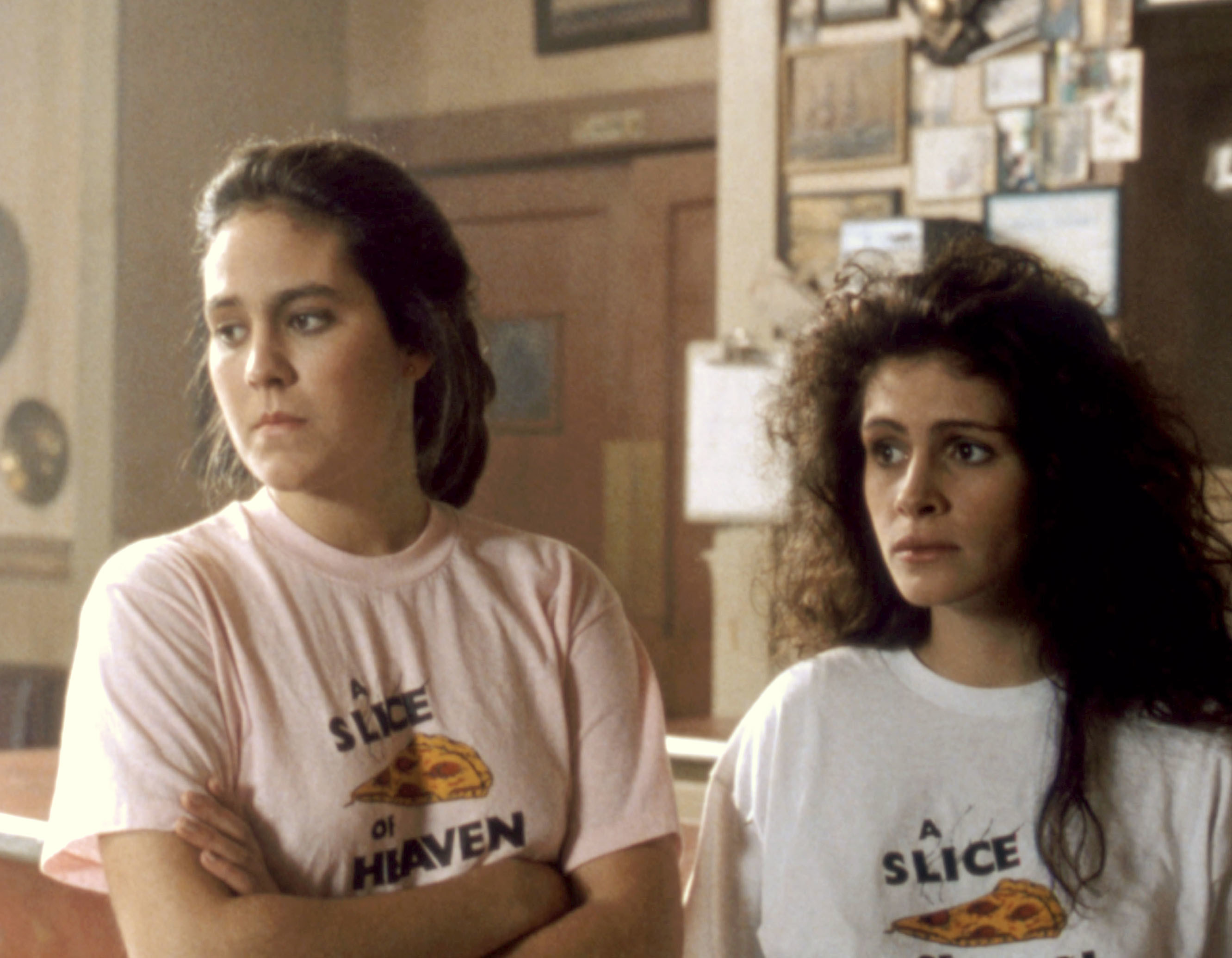 Annabeth Gish and Julia Roberts looking concerned.