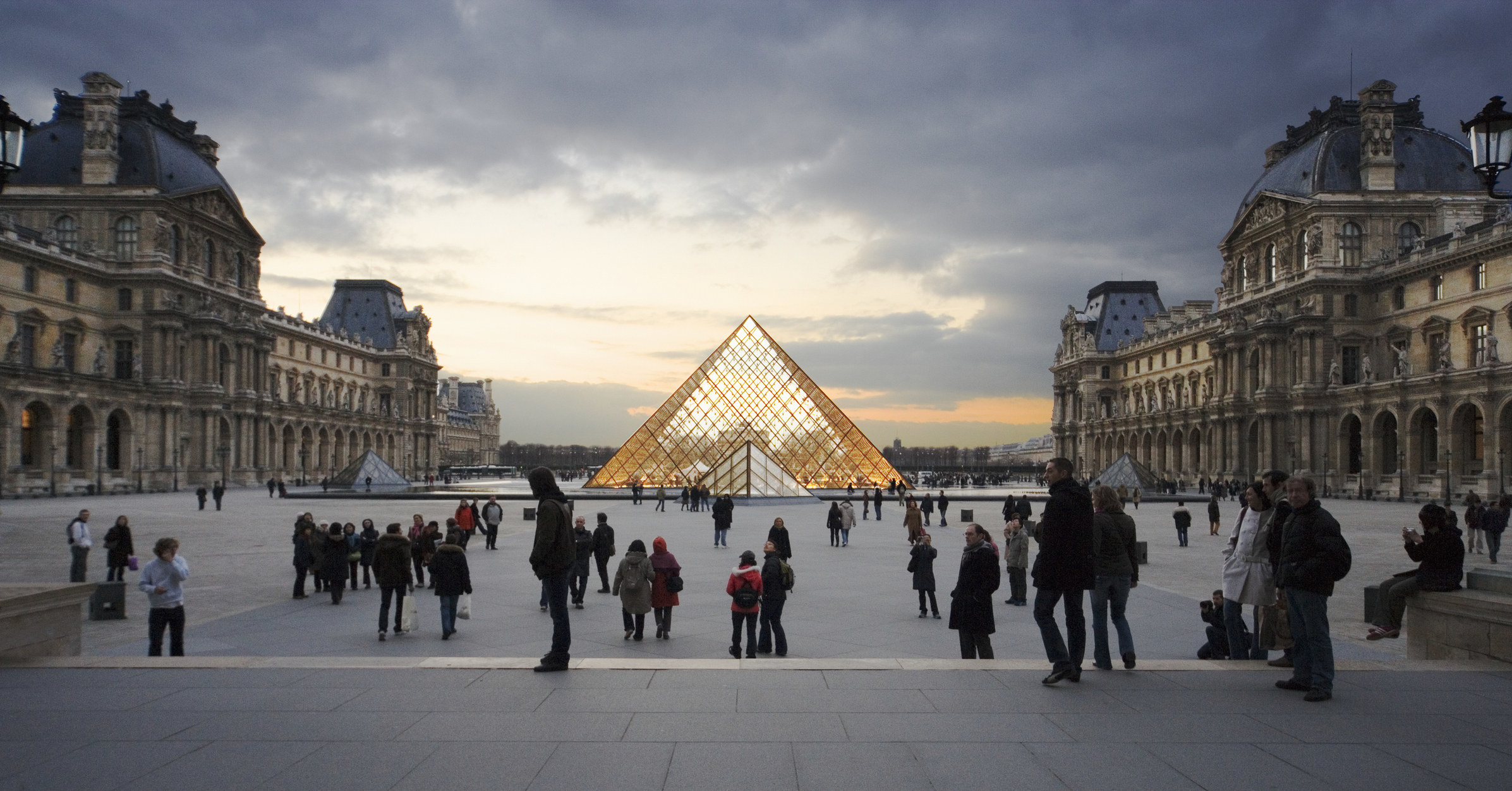 People outside of the Louvre in Paris.