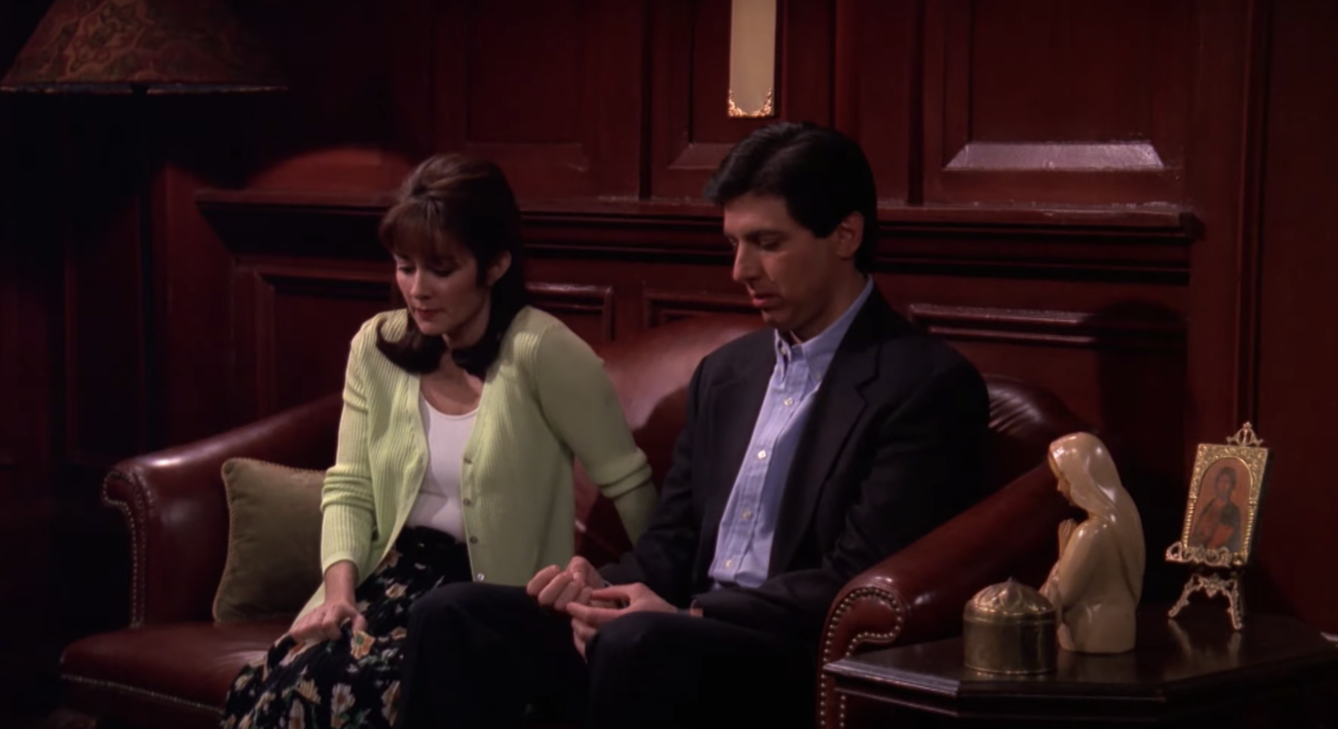 Ray and Debra sitting in an office in a church