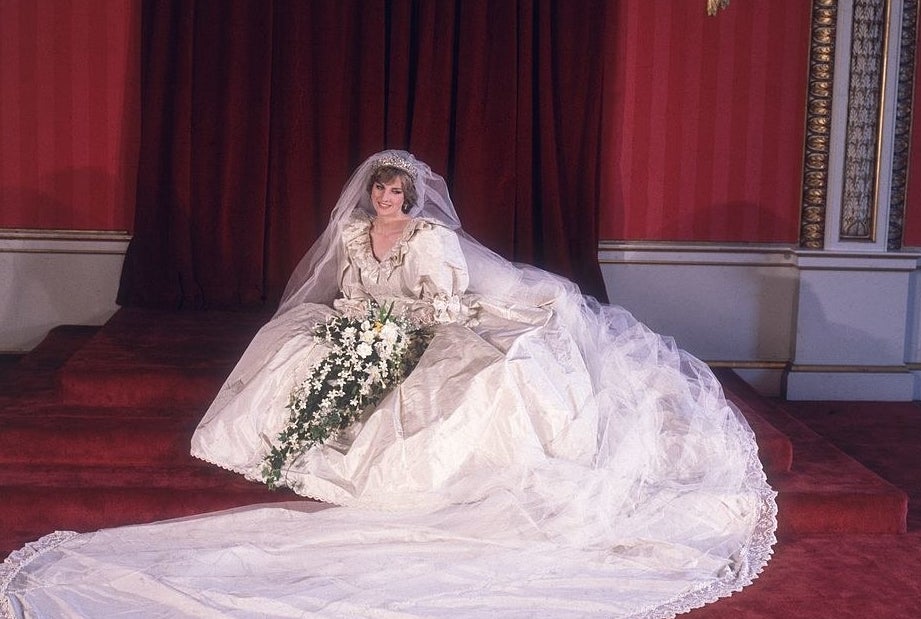 Princess Diana posing in her wedding gown
