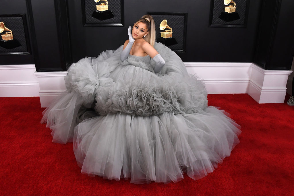 Ariana Grande posing in her iconic poofy gown on the Grammy&#x27;s red carpet