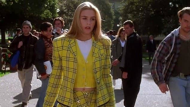 Cher walking on campus in her iconic plaid outfit