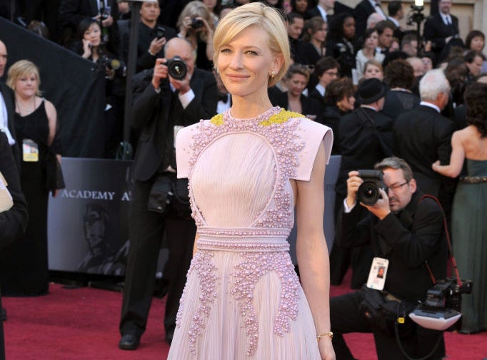 Cate Blanchett posing on the red carpet at the 2011 Academy Awards