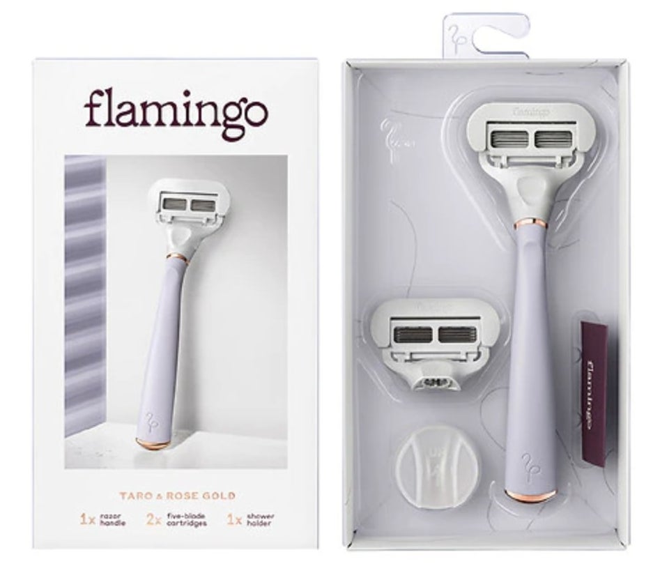 A lilac, 5-blade razor with a replacement blade cartridge
