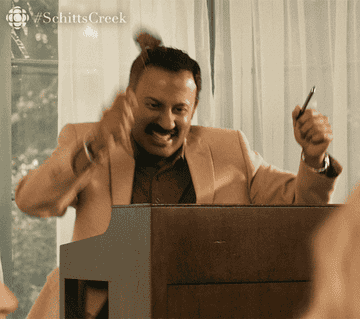 A GIF of someone using a gavel and saying sold