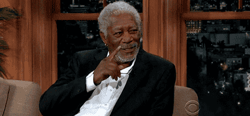 Man in suit jacket laughs