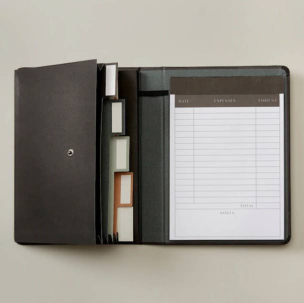 The receipt organizer open to show the tabs and notepad