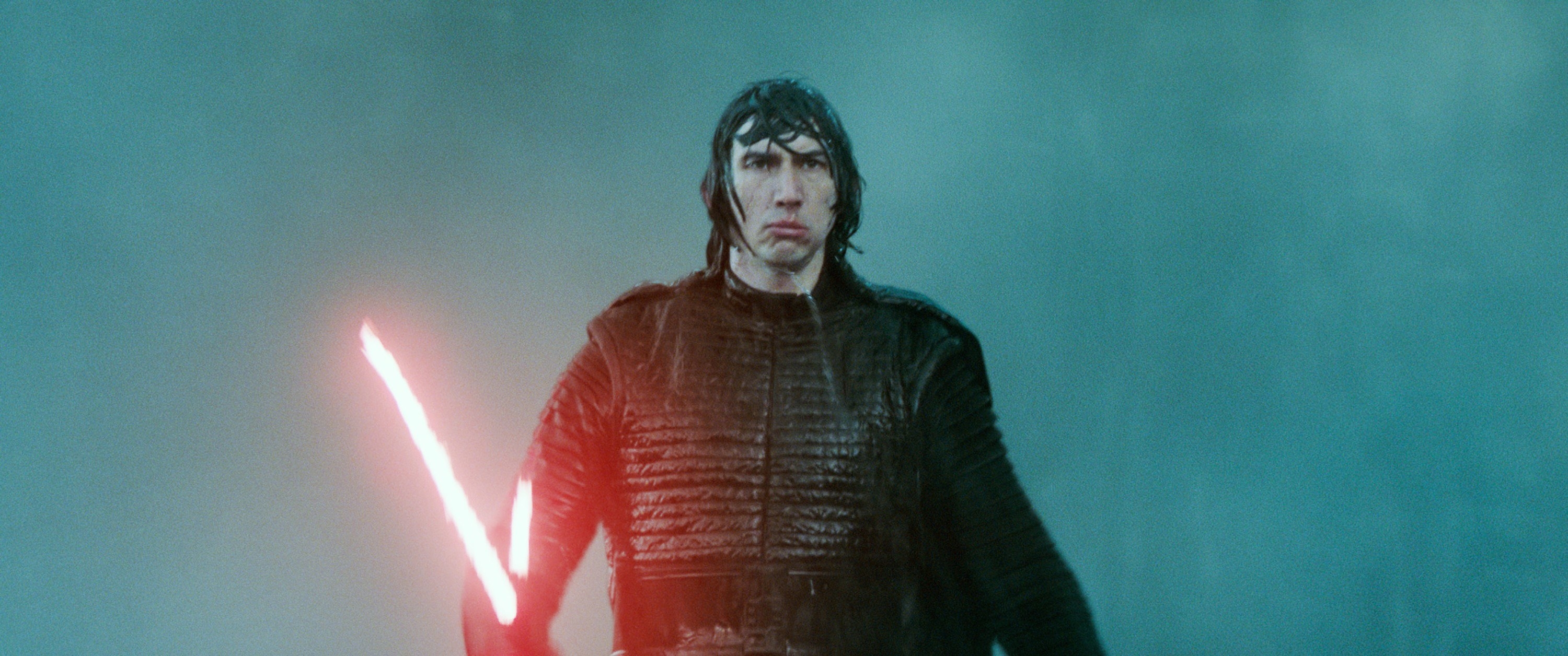 Kylo Ren holding his iconic lightsaber in &quot;Star Wars&quot;