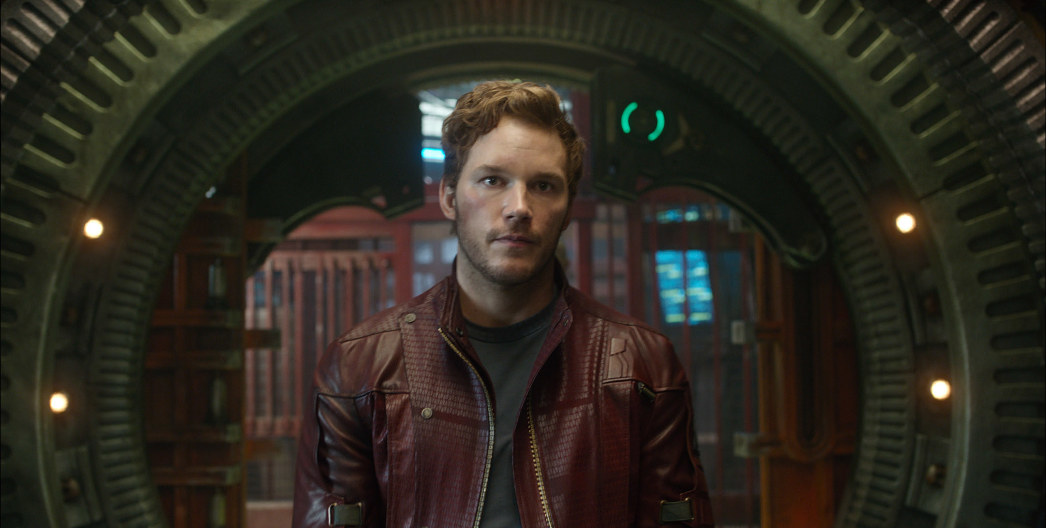 Chris Pratt in a red leather jacket as Star Lord