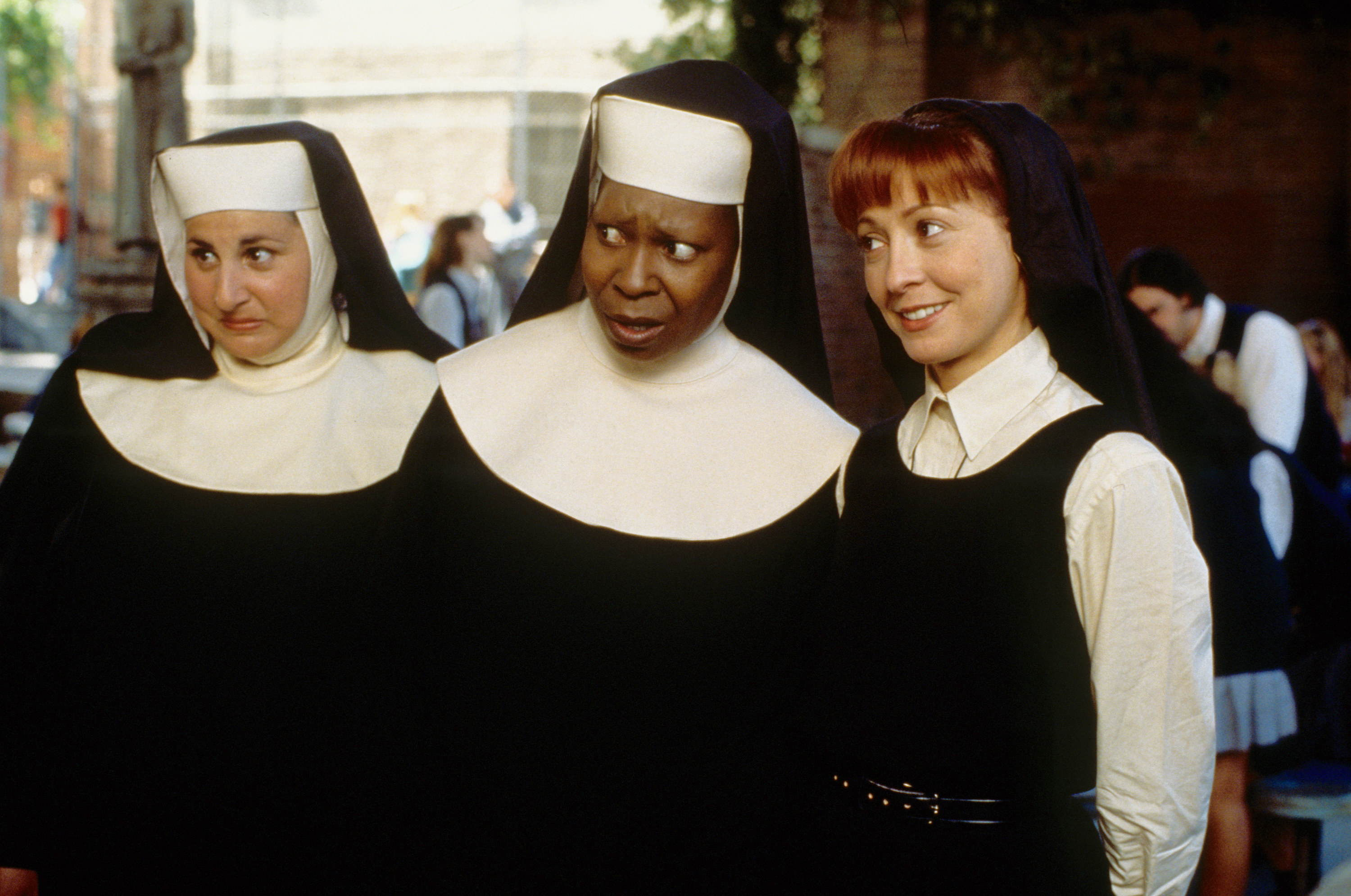 Kathy Najimy, Whoopi Goldberg, and Wendy Makkena dressed as nuns