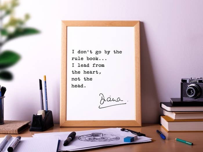 a framed princess diana quote that says &quot;I don&#x27;t go by the rule book...I lead from the heart, not the head&quot;