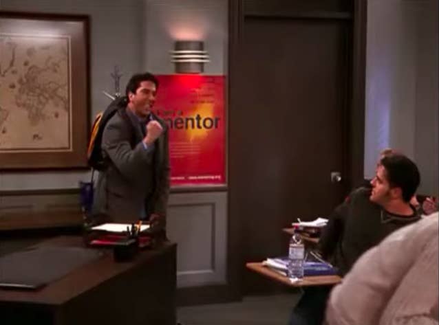 Ross walking into his class to teach on "Friends"