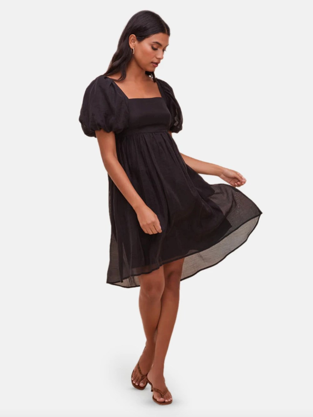 the ASTR the Label bethel dress in black on a model