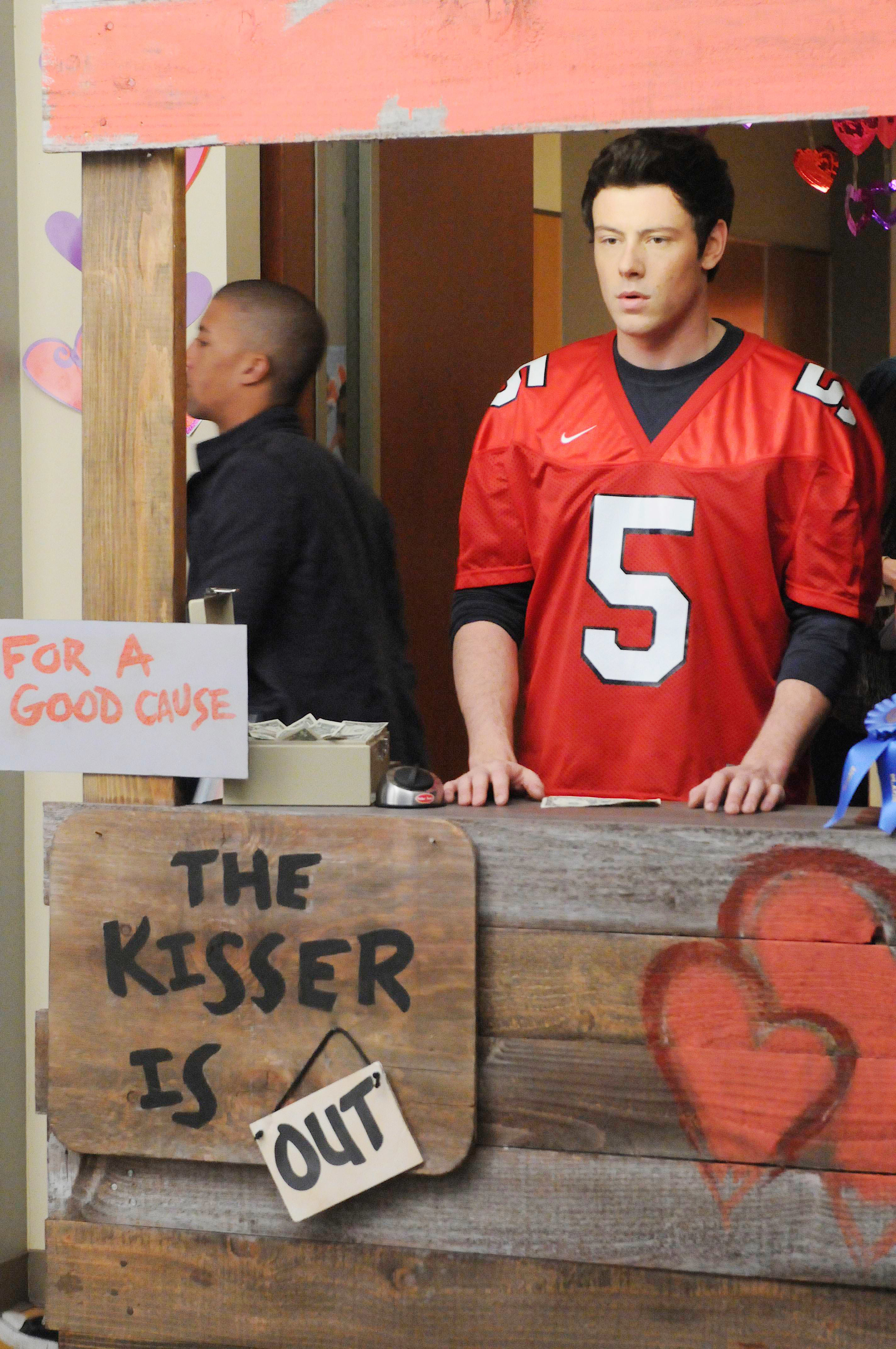 Cory Monteith wearing a football jersey on the set of &quot;Glee&quot;