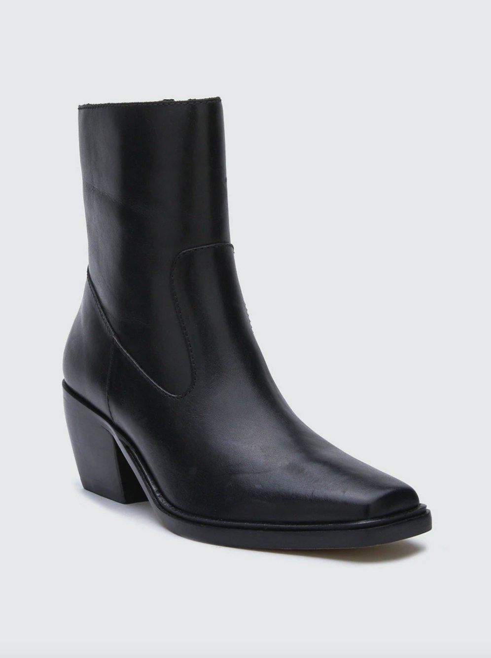 the pair of leather boots in black