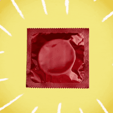 A GIF of a condom in a wrapper on a yellow background