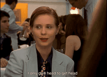 A GIF of Miranda from &quot;Sex and the City&quot; saying &quot;I only give head to get head&quot;
