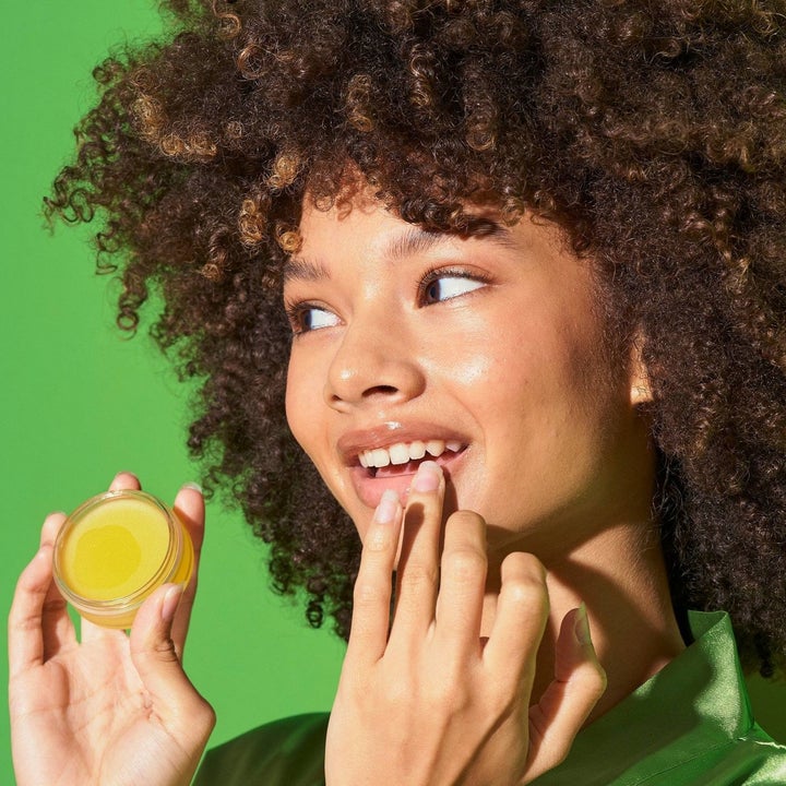a model applying the lip mask