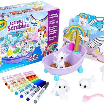 The coloring set with blank toys, a tub, markers and a standing play mat