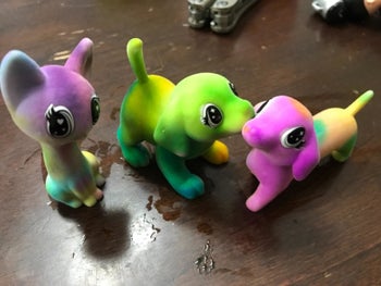 Reviewer's photo showing three animal figures colored