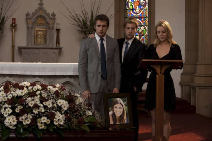 The Rafter family at a funeral mourning Melissa's death