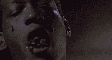 Bees crawling out of the mouth of Candyman in the original film