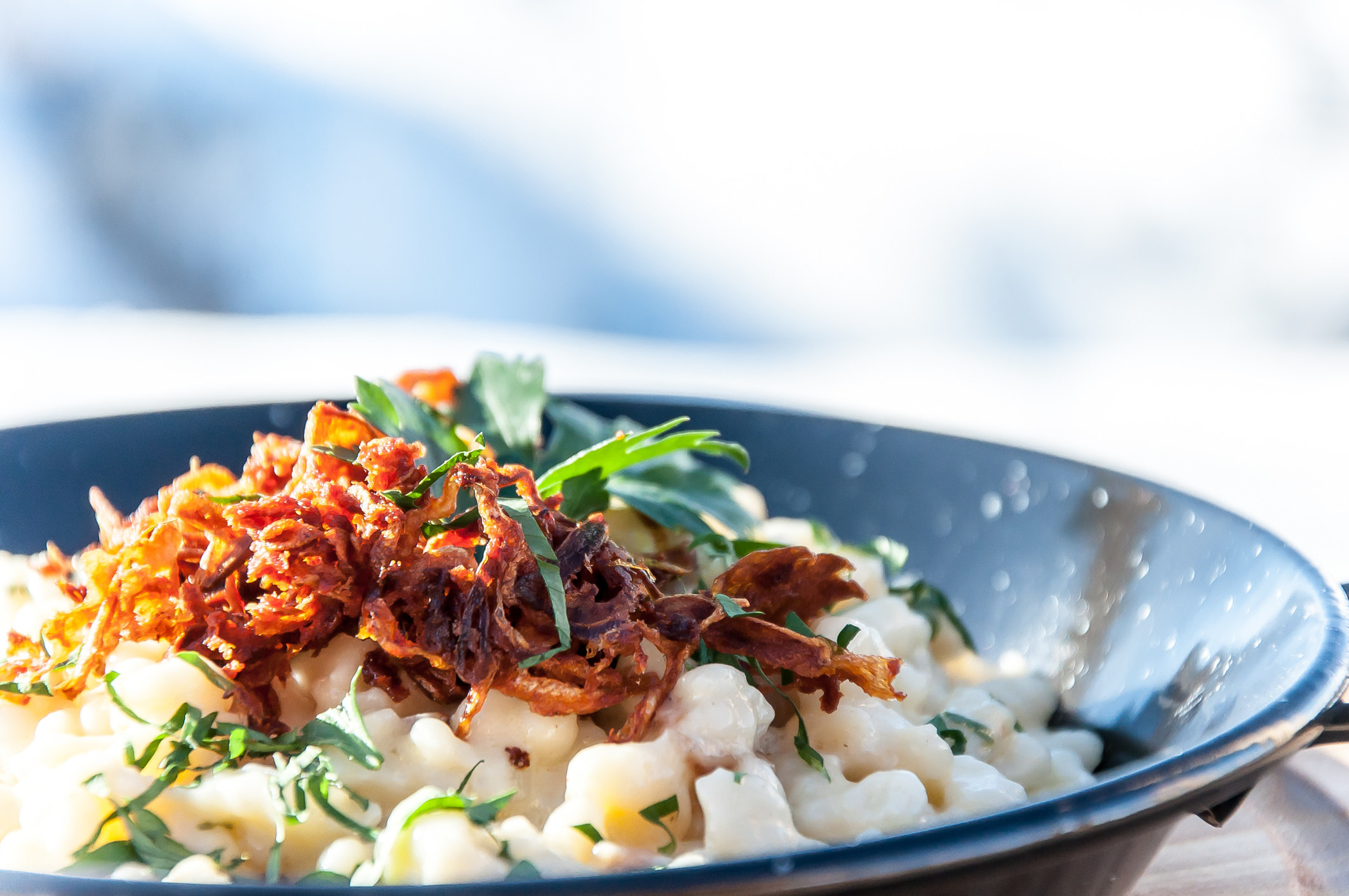 German käsespätzle with fried onions.