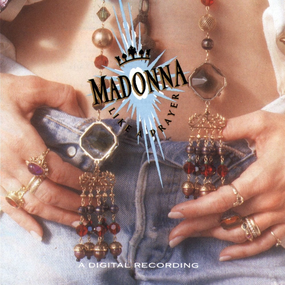 close-up of madonna&#x27;s hands on her jeans