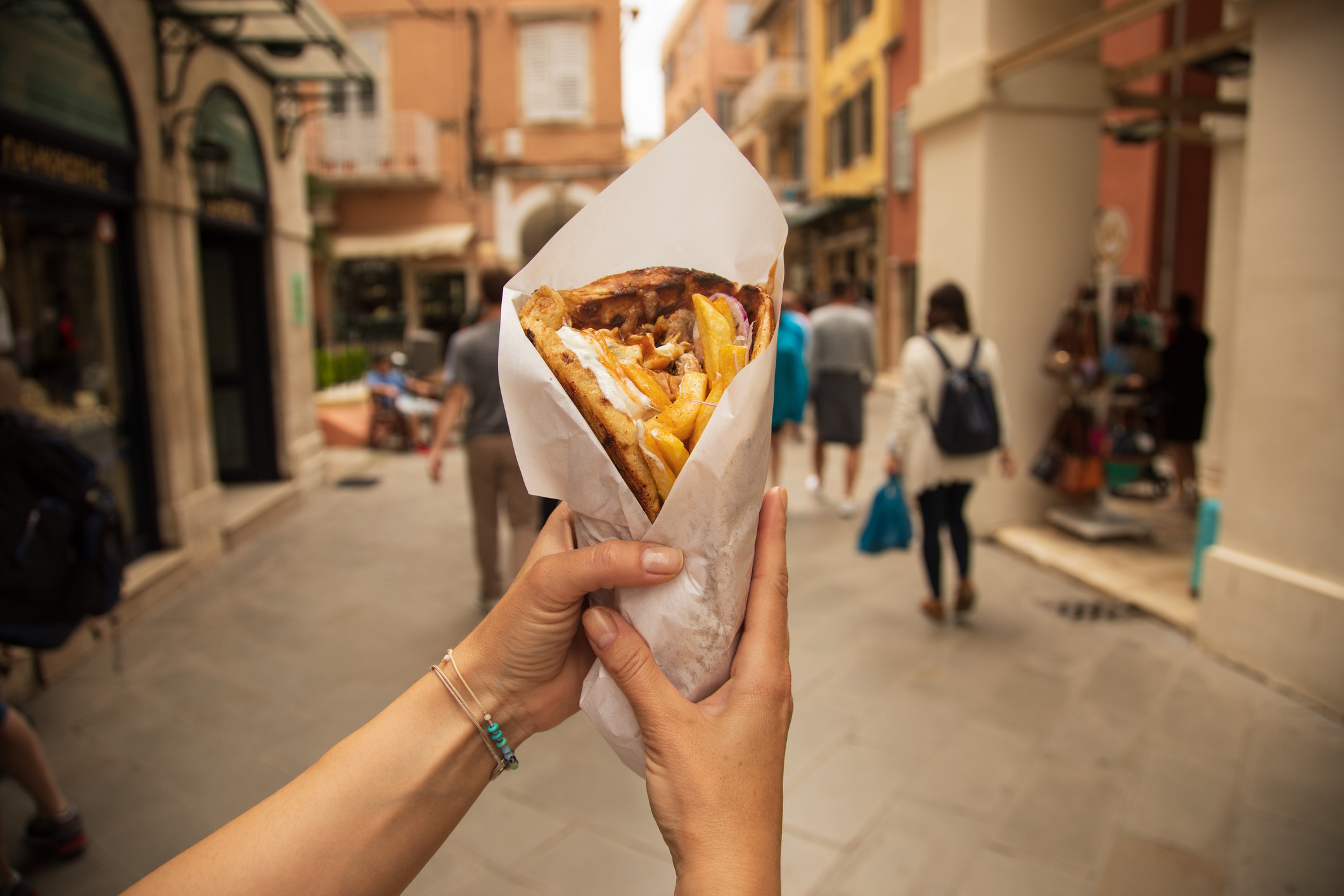 A gyro with fries.