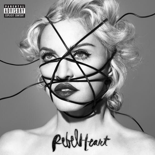 madonna&#x27;s face wrapped in cords with the words &quot;rebel heart&quot; written on her neck