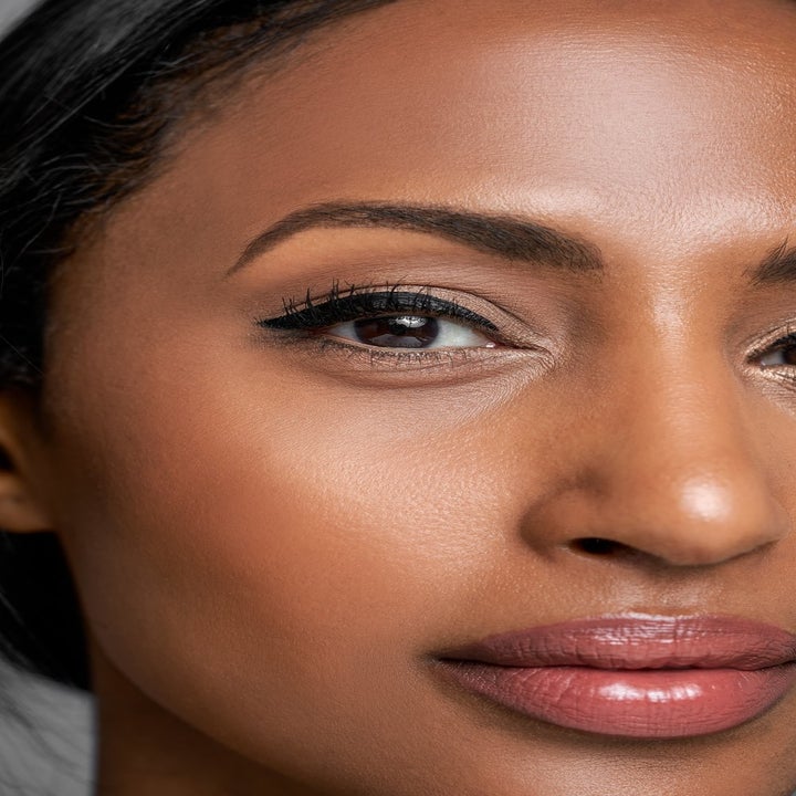 model wearing a thick cat-eye eyeliner look