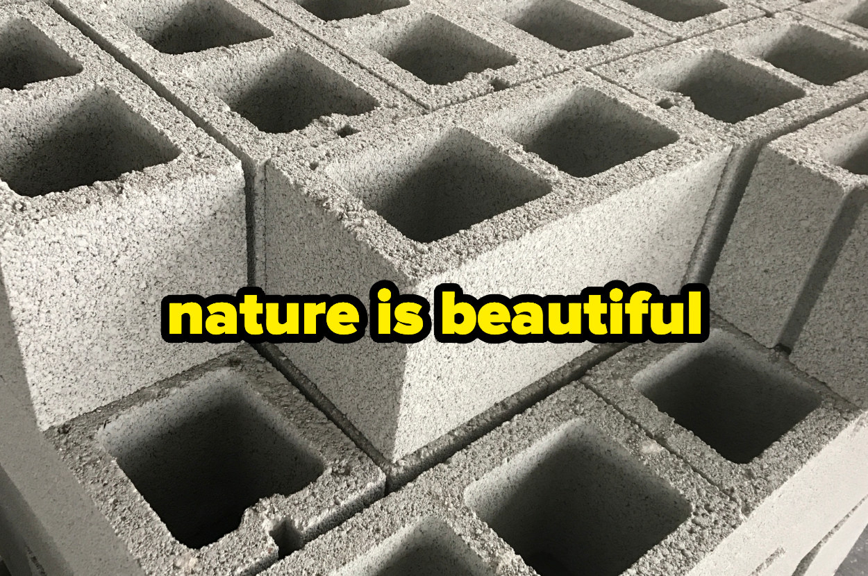 pile of cinder blocks and the words &quot;Nature is beautiful&quot;