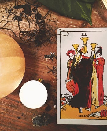 one card with the sanderson sisters dancing in a circle 