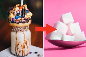 A milkshake is on the left with an arrow pointing at cubes of sugar