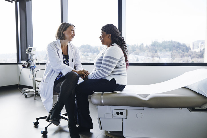 stock photo of doctor talking to a patient