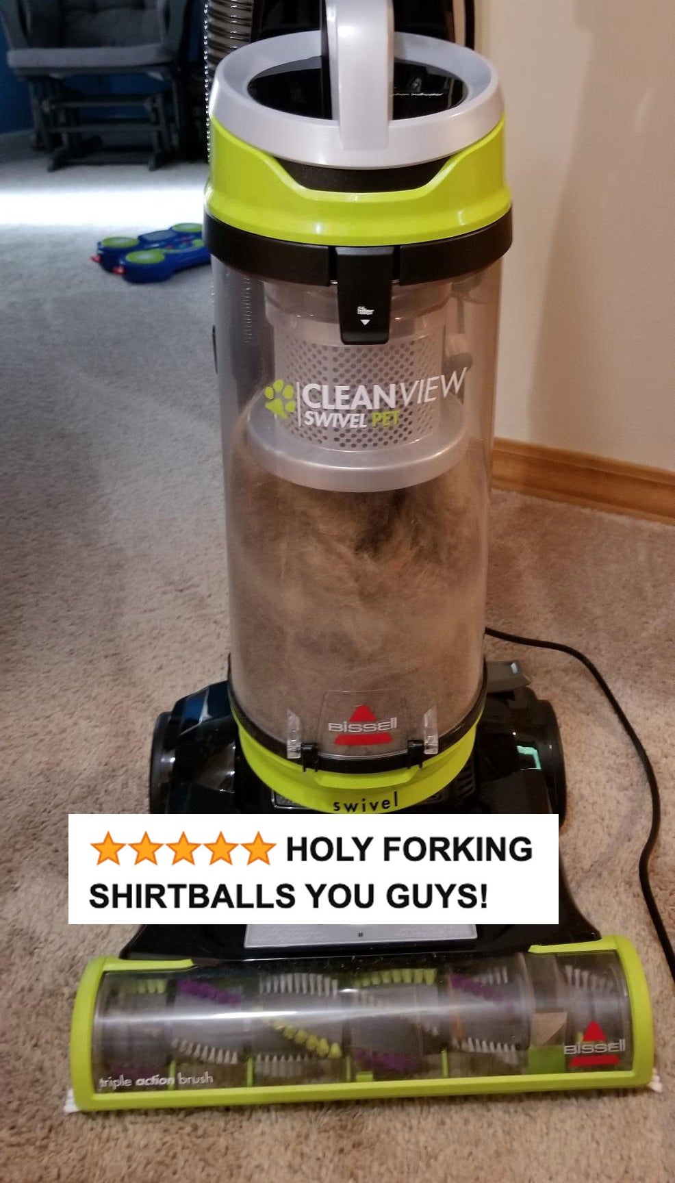 The vacuum filled with pet hair and dust with five stars and review text &quot;holy forking shirtballs you guys!&quot;