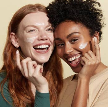 Models applying It Cosmetics Confidence In A Cream to their faces