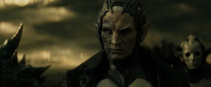 Malekith stands in front of Thor in Thor Dark World, furrowing his brows in anger