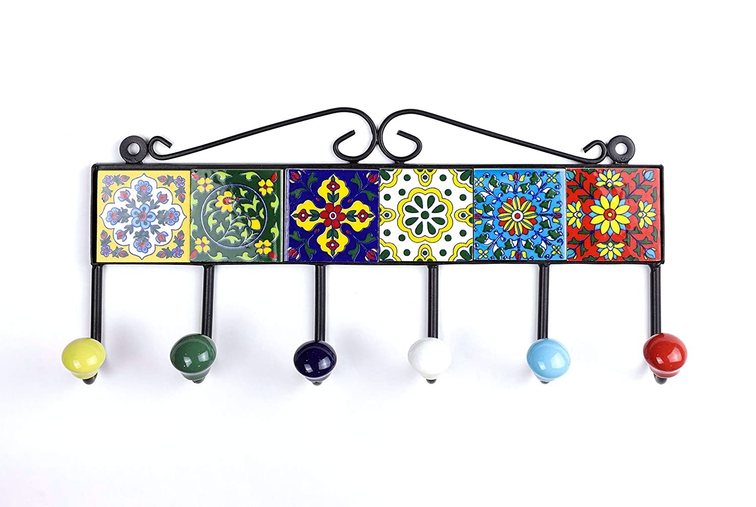 An iron key holder fitted with colorful blue pottery tiles and 6 colourful ceramic hook ends