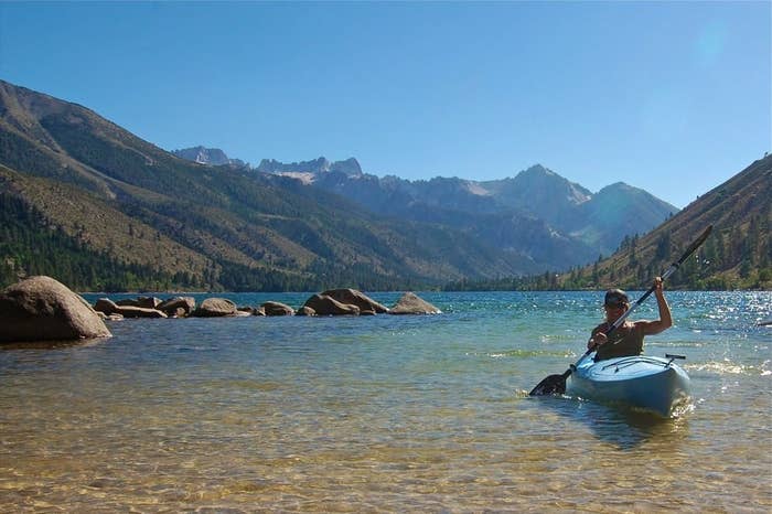 Woman in a kayak on the water