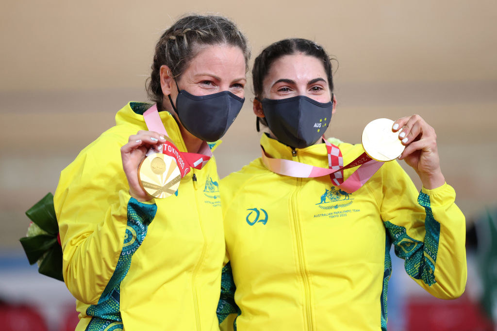 Emily Petricola (L) and Paige Greco (R) holding up their gold medals