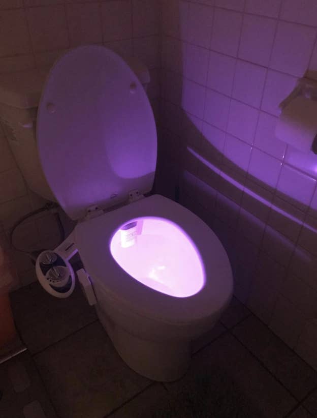 A motion-activated toilet light so you won't have to fully disrupt