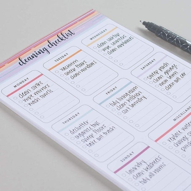 A checklist planner pad with blank spaces for chores on each day of the week