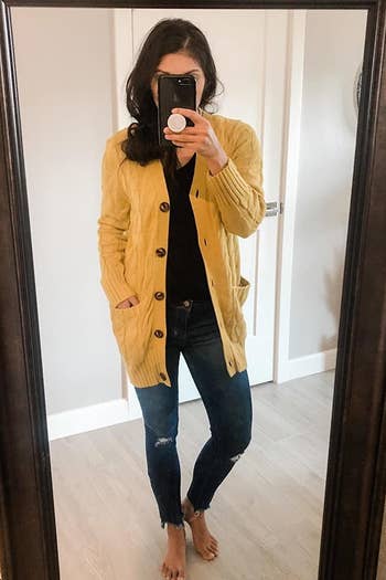 reviewer wearing the mustard version