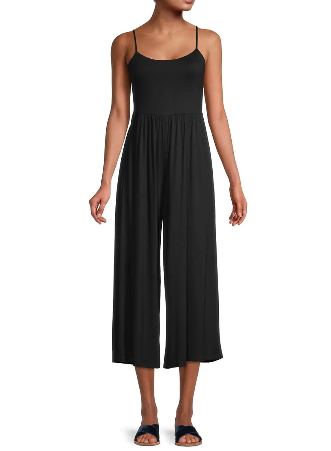 model wearing the all black jumpsuit with black sandals