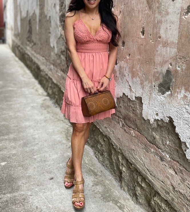 reviewer wearing the pinkish  version